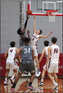 Cardinal Varsity Boys Basketball  First Half Deficit Causes Defeat